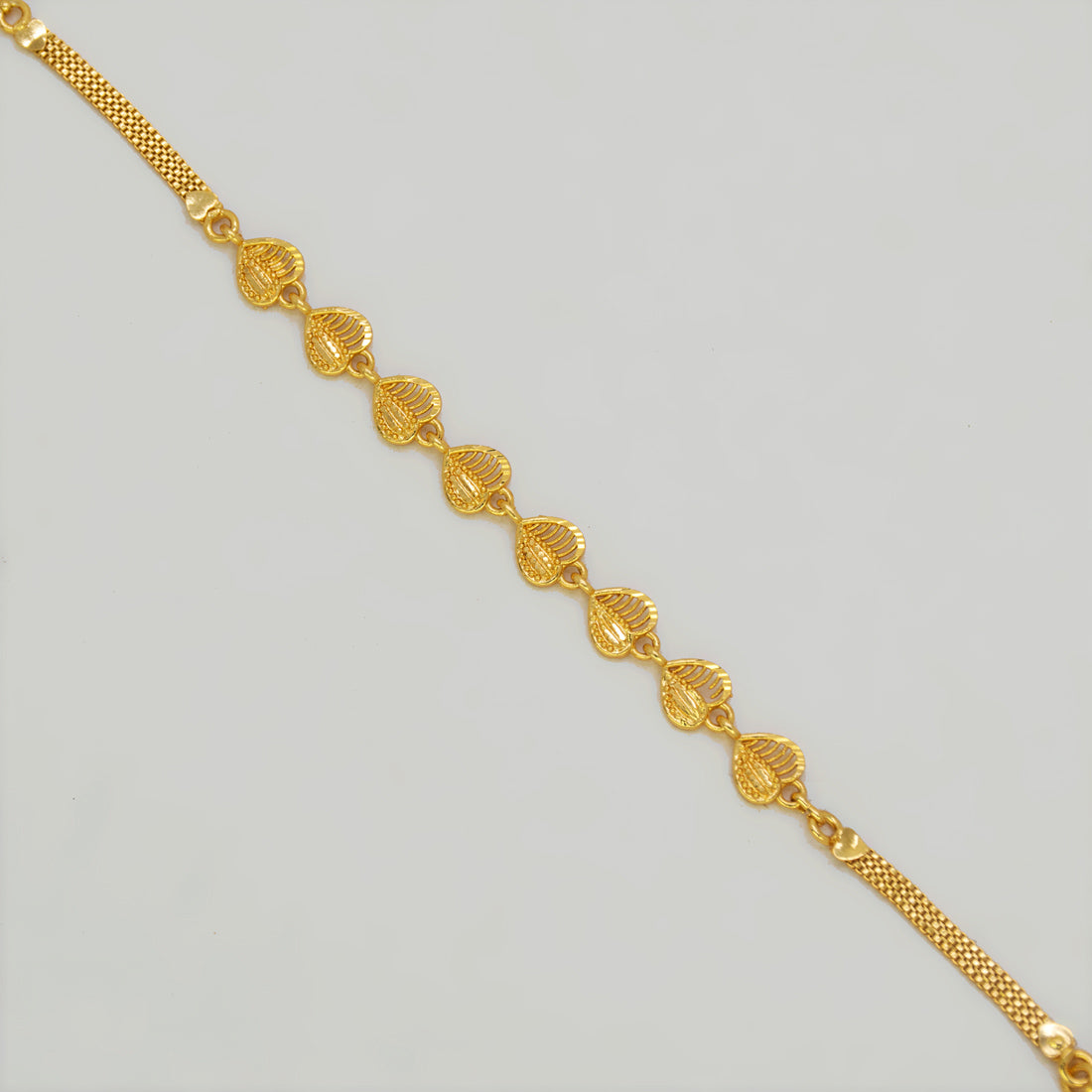 Gold-Plated Mesh Heart Triple Kilukkam Chain Bracelet