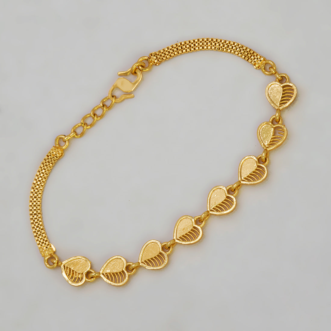 Gold-Plated Mesh Heart Triple Kilukkam Chain Bracelet