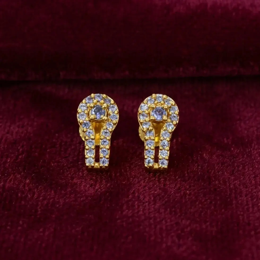 Gold Plated Purple CZ Stone Stud Earrings featuring a contemporary design with a halo effect, perfect for elegant everyday wear.
