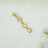A gold-plated three-tier stone floral drop pendant charm featuring three small floral clusters of CZ stones, displayed on a textured off-white fabric background.