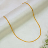 A Gold-Plated Traditional Kids Urvashi Chain- 15" draped in a U-shape over a soft, off-white satin fabric background.