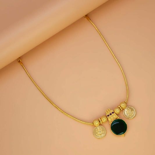 Green Enamel Gold Plated Lakshmi Kasu Necklace featuring a green stone pendant and Lakshmi coins.