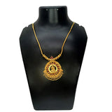 Ethnic Gold Plated Ruby Stones Lakshmi Pendant Necklace on display with intricate design and gold bead dangles.