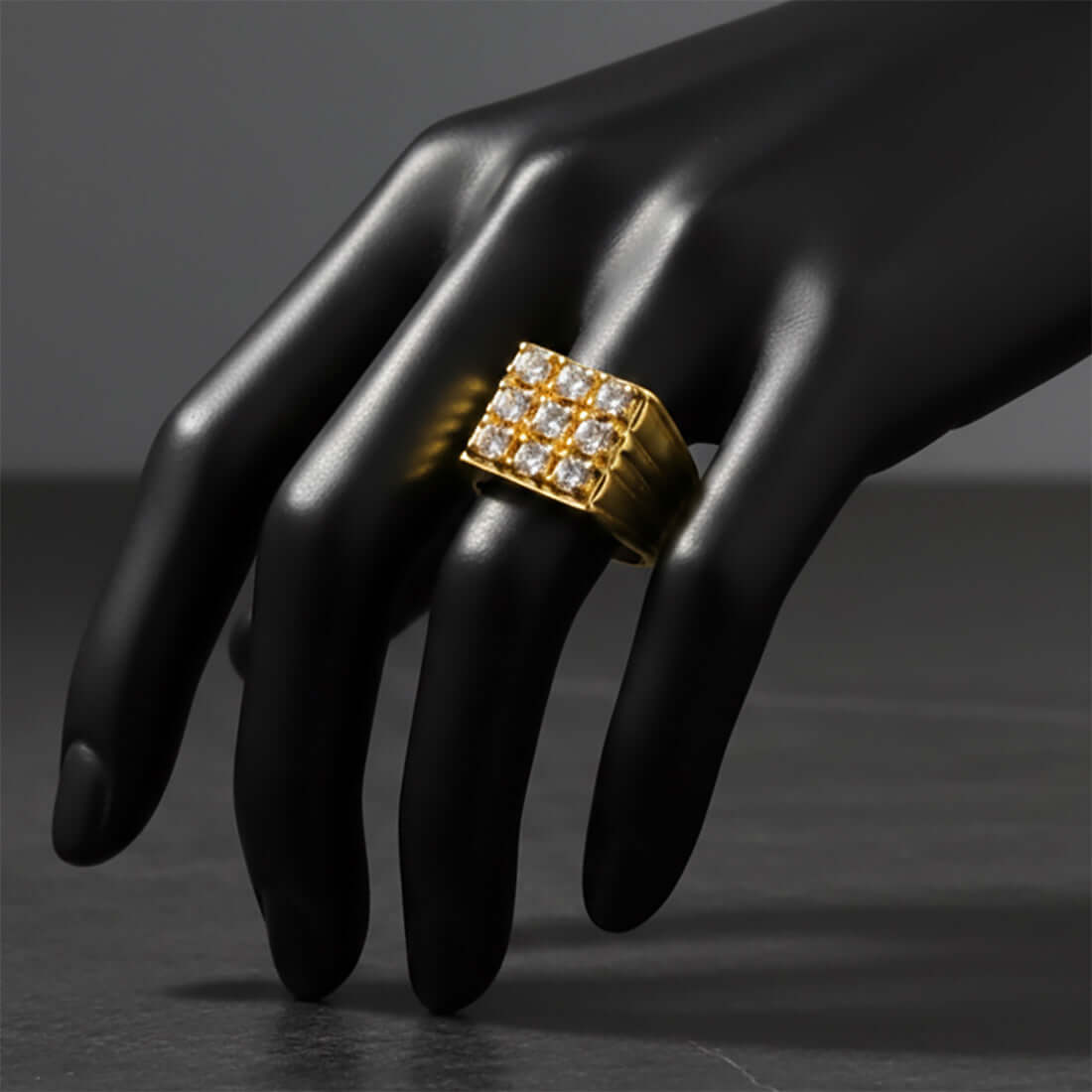 Premium Gold Plated Gent's AD Stone Finger Ring showcased on a stylish black hand model.