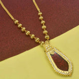 Premium Gold Plated Ball Necklace With Nagapadam Pendant highlighting a striking red gemstone and intricate design.