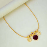 Green Enamel Gold Plated Lakshmi Kasu Necklace featuring a ruby stone and Lakshmi coins.