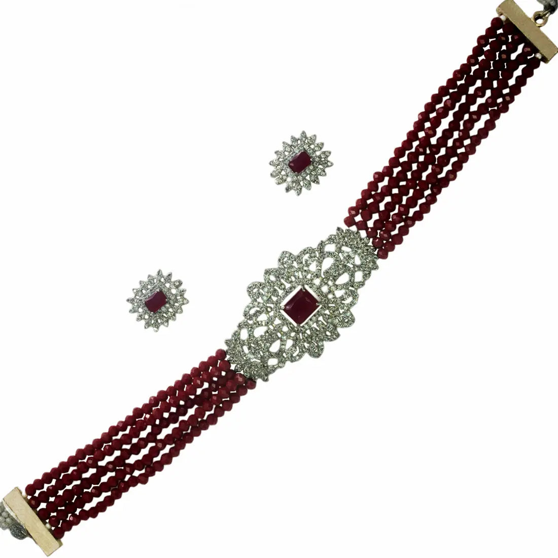 Elegant Multi-Strand Crystal American Diamond Choker Set featuring maroon crystals and intricate design.