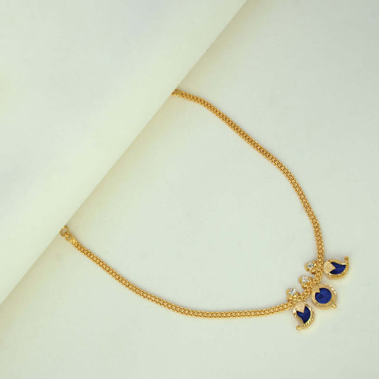 Simple Three Petal Gold Plated Mango Necklace with blue CZ stones and round pendant on a flat chain.