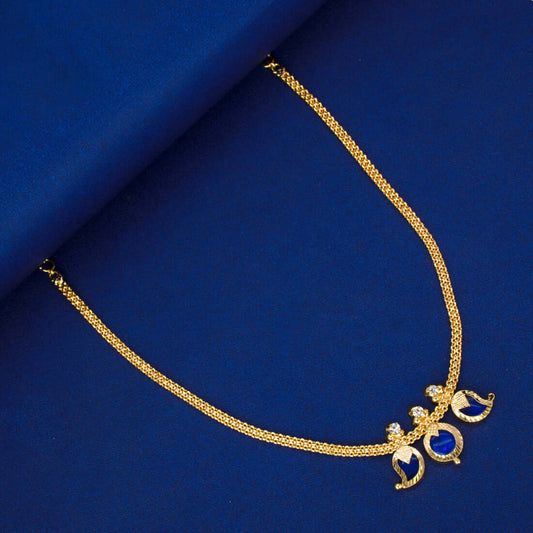 Simple Three Petal Gold Plated Mango Necklace with blue mango CZ stones and round pendant on a blue background.