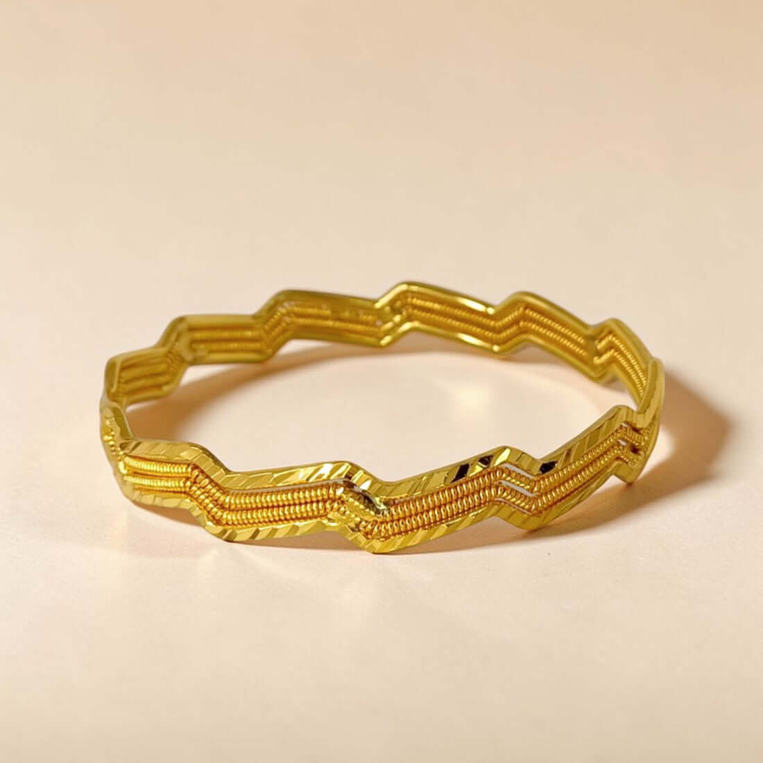 Stylish Gold Plated Zigzag Spring Design Bangle