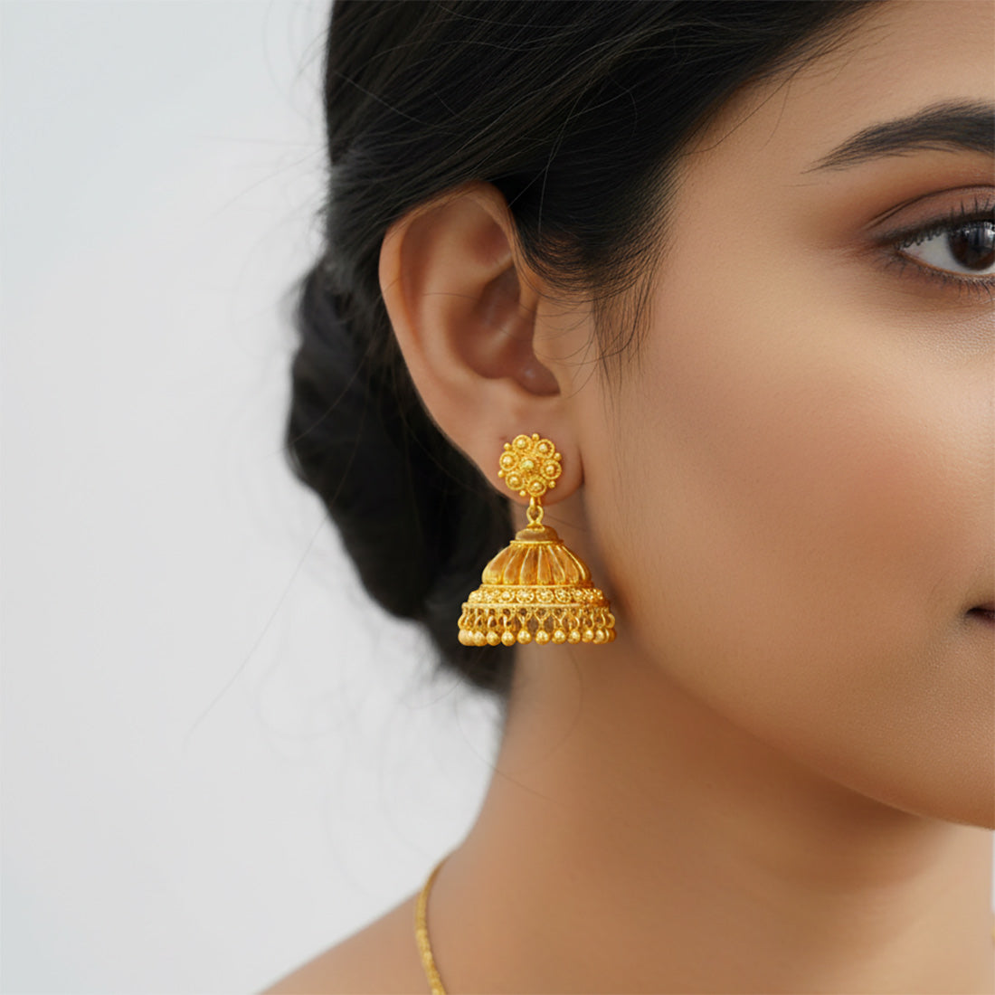 Stylish-gold-plated-medium-jhumka-earrings