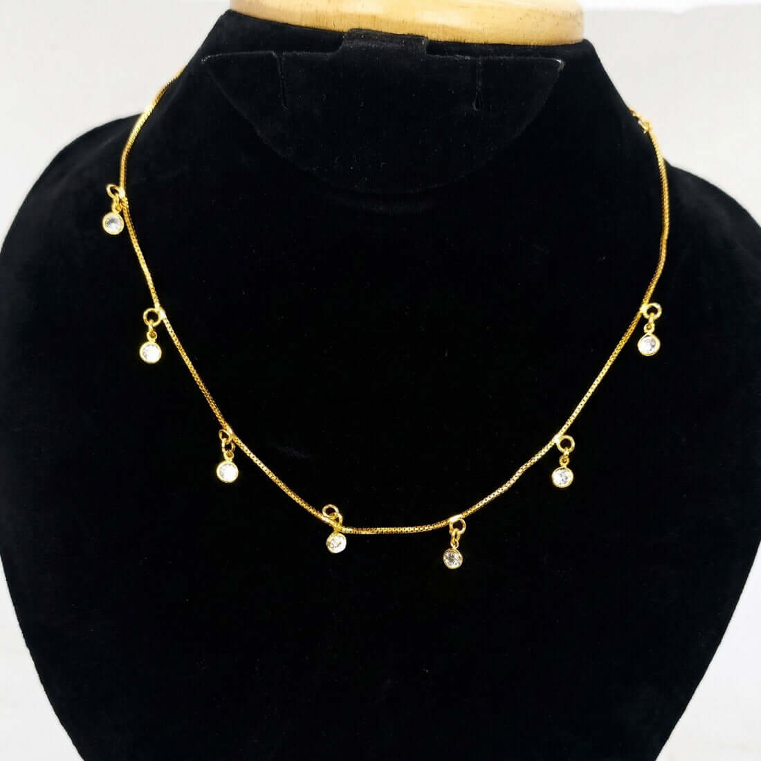 Gold-plated necklace with small White pendants
