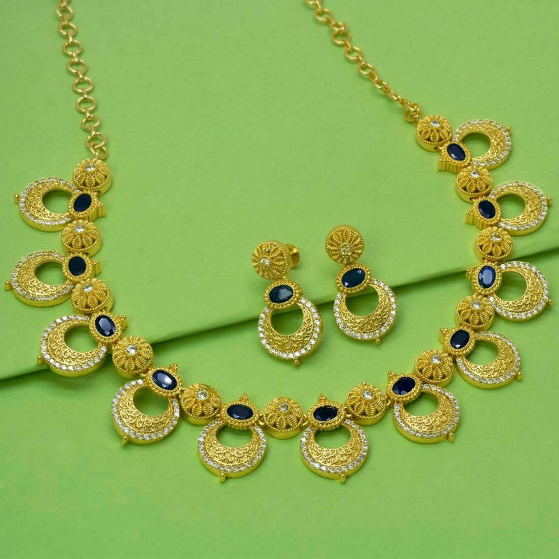 AD Blue Sapphire Floral Chandbali Necklace Set featuring intricate motifs and matching earrings.