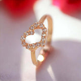 Charming Rose Gold Polished Fashion White Stone Heart Ring with micro-pavé white CZ stones in a heart shape.