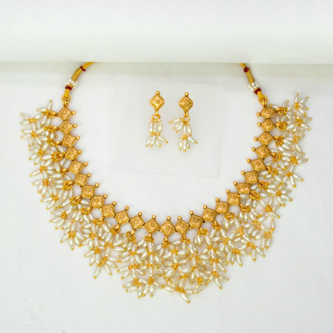 Exquisite Gold Plated Pearl Hanging Choker Necklace Set featuring gold accents and dangle pearls, perfect for formal occasions.
