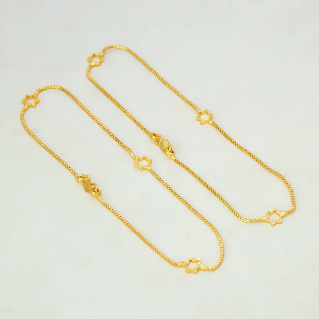 Delicate Gold Plated Star Box Chain Anklets featuring a fine box-chain design with star charms.