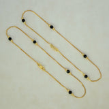K Supreme gold plated brass anklets with box chain, black crystals, and gold beads. S hook closure.