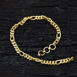 K Supreme gold plated brass figaro chain bracelet with S hook closure, 4mm width, suitable for men and women.