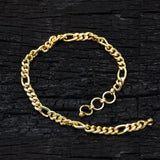 K Supreme gold plated brass figaro chain bracelet with S hook closure, 8 inches long, 4mm wide.