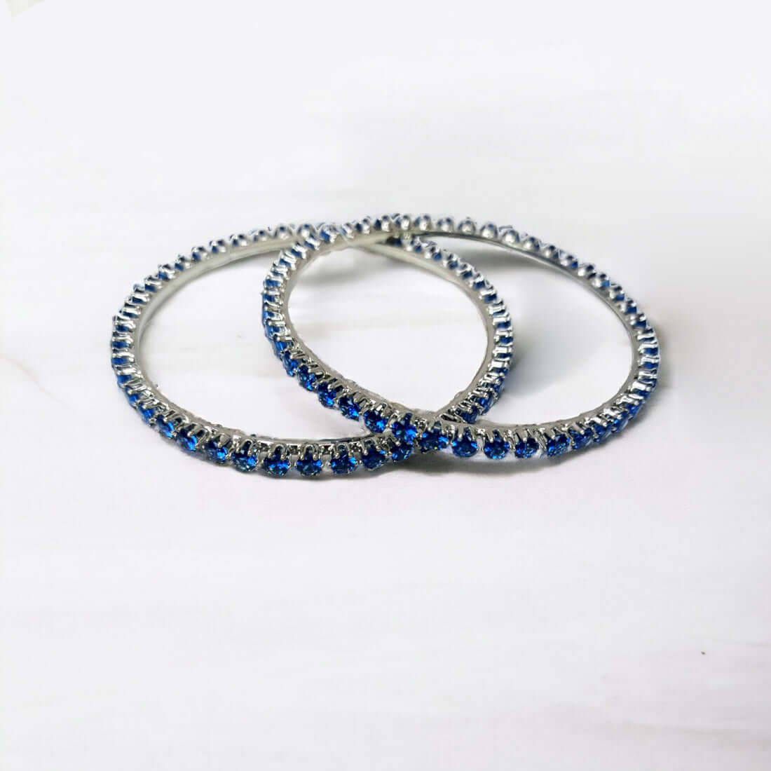 Radiant Rhodium Plated Blue Sapphire Stone Bangles - K Supreme