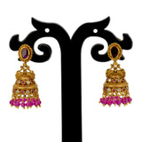 Small Antique Gold Plated Stone Jhumka For Girls with pink beads and intricate detailing.