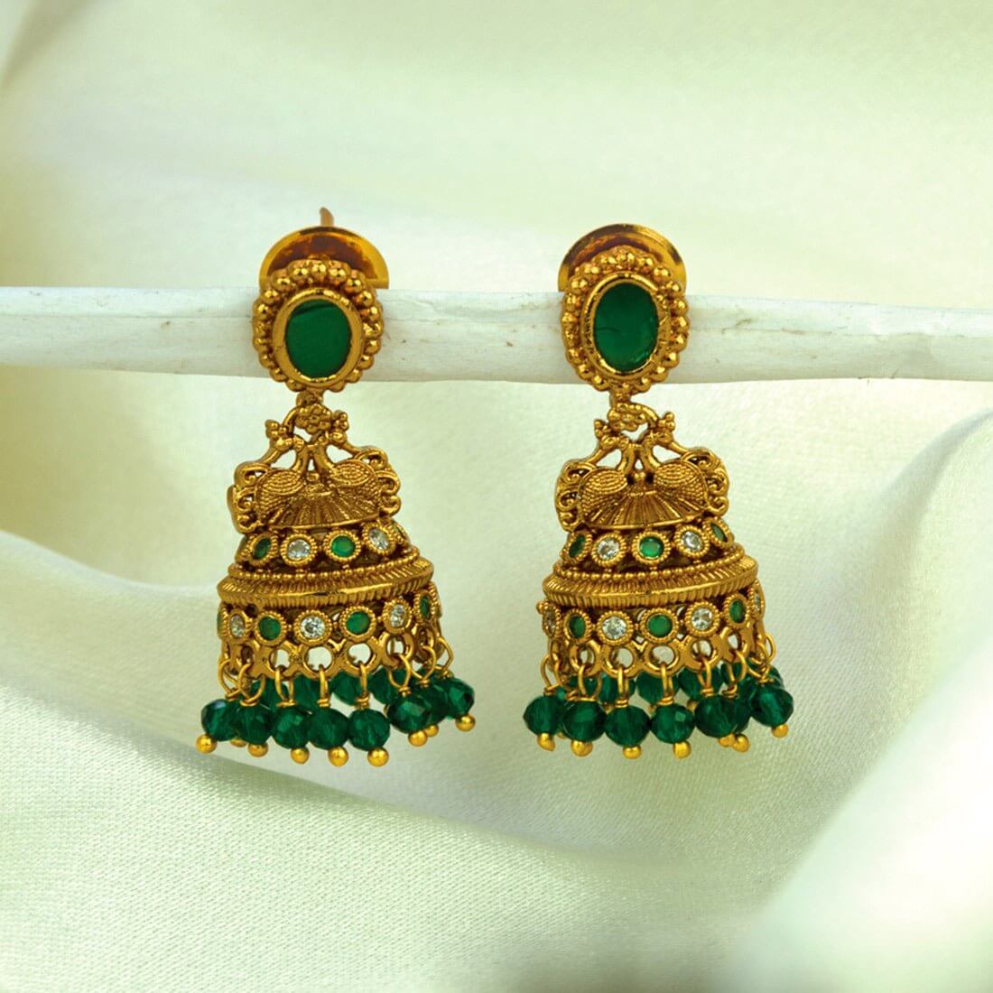 Small Antique Gold Plated Stone Jhumka For Girls with intricate design and twin peacock stones, perfect for ethnic wear.
