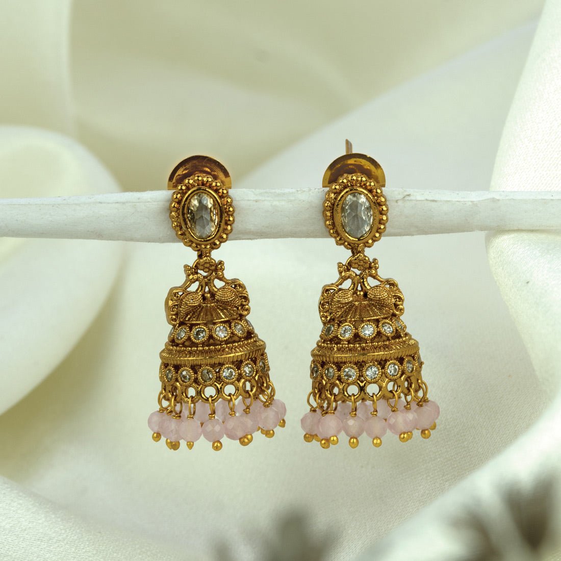 Small Antique Gold Plated Stone Jhumka For Girls with intricate design and dangling beads. Perfect for ethnic wear.