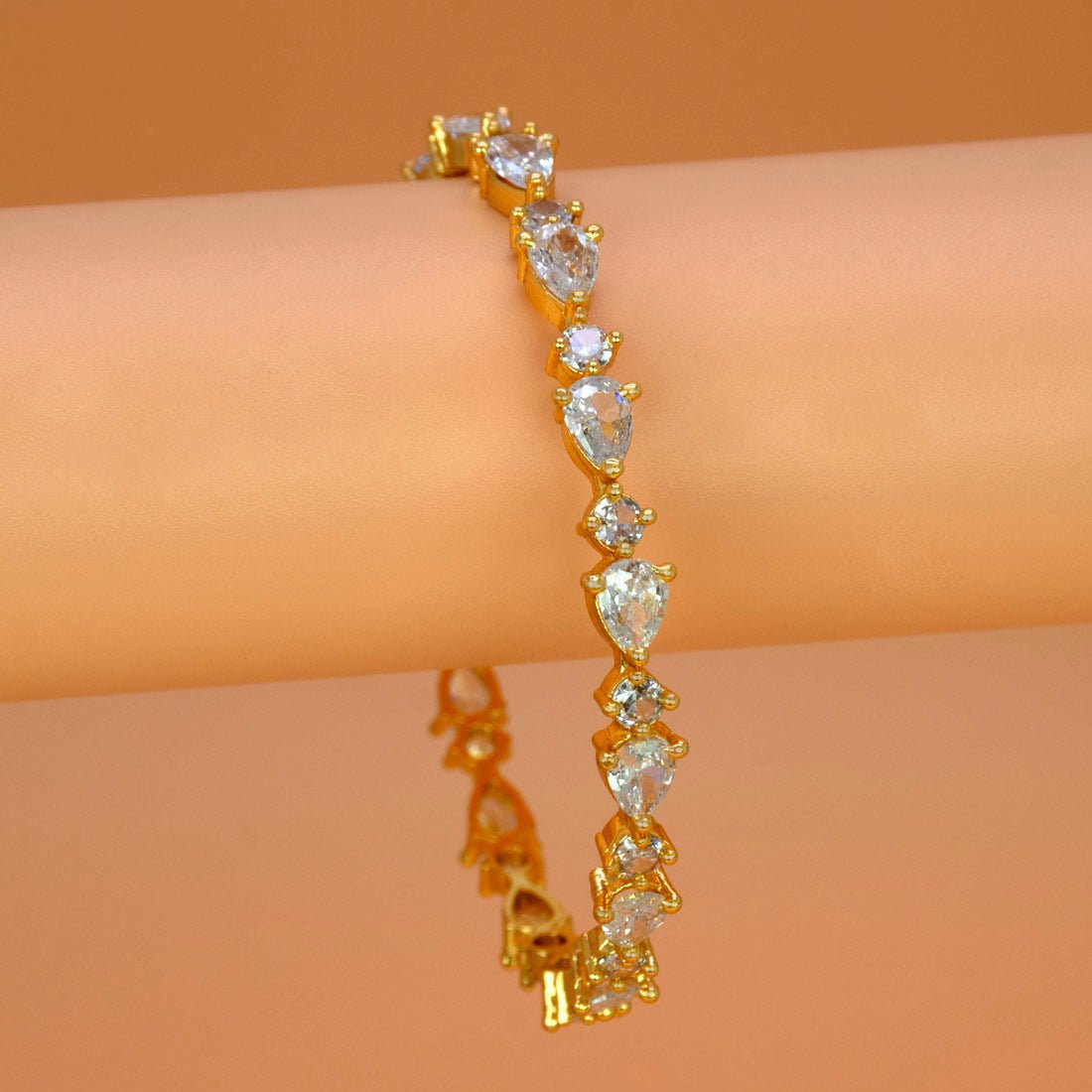 Sparkling Gold Plated Oval and Round Stone Bangle - KSupreme