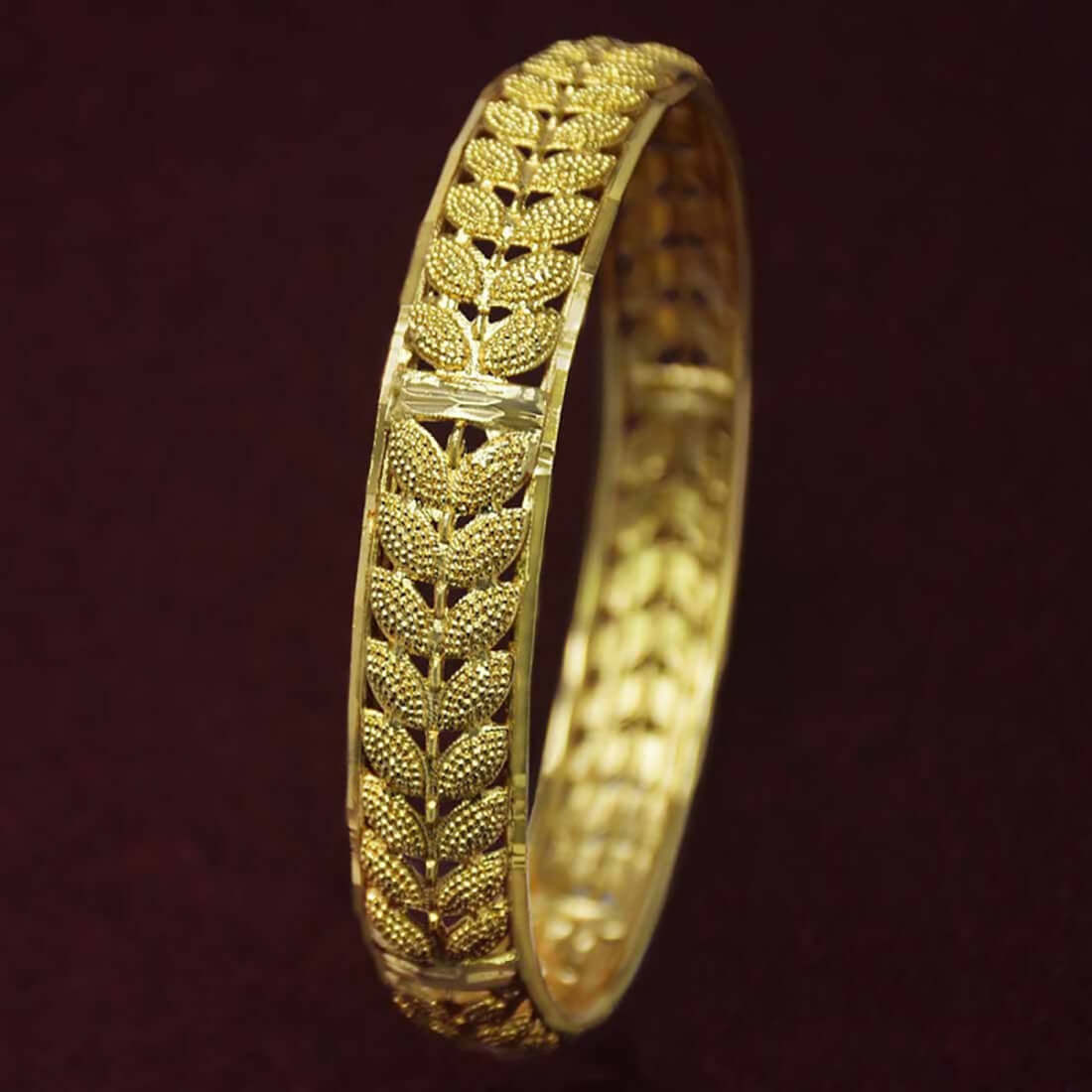 Stylish Trendy Gold Plated Medium Leaf Net Bangle showcasing intricate leaf design and contemporary elegance.