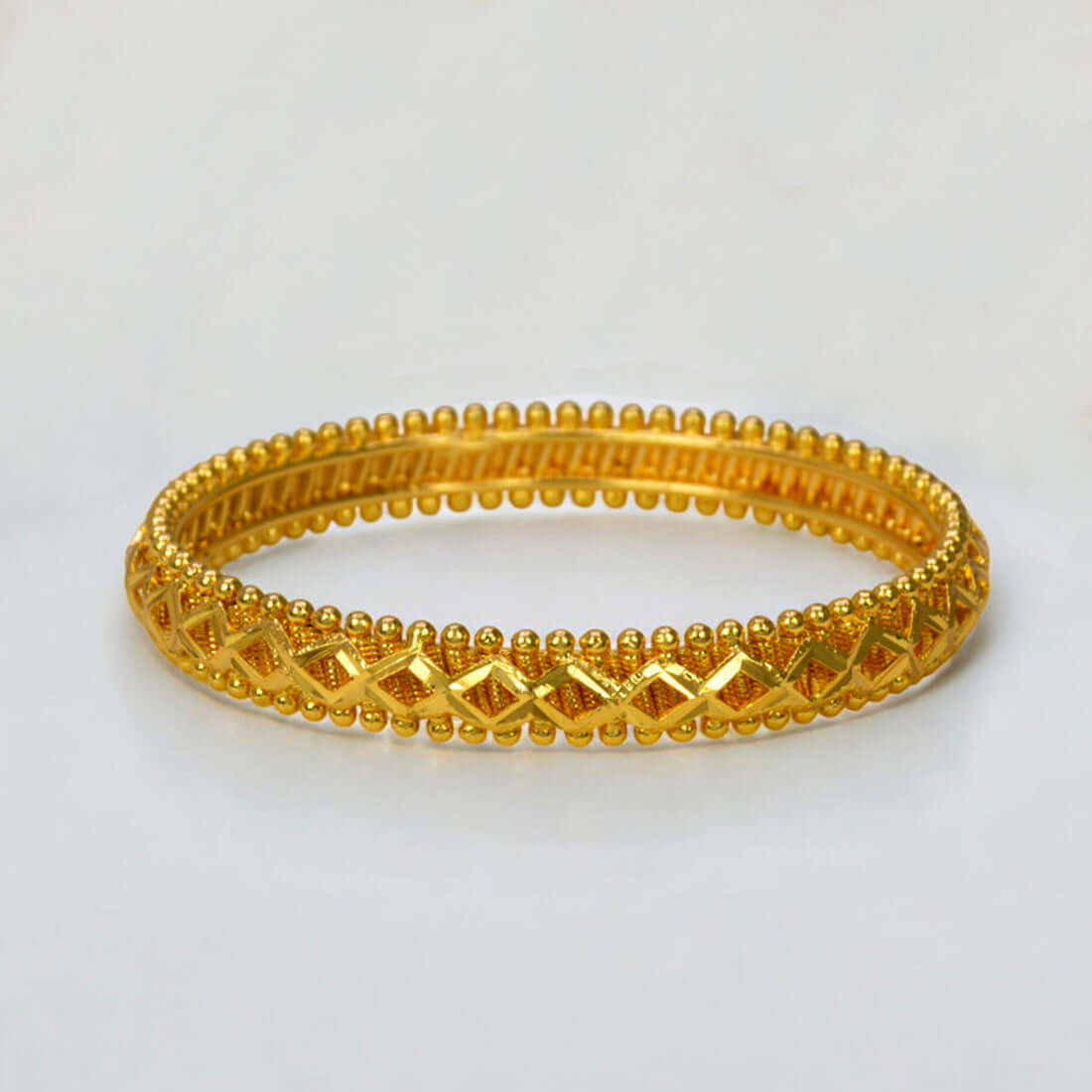 Trendy Gold Plated Spring Design Bangle - K Supreme